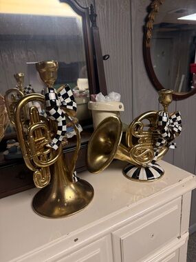 Mackenzie Childs Horn and Trumpet candle holders.